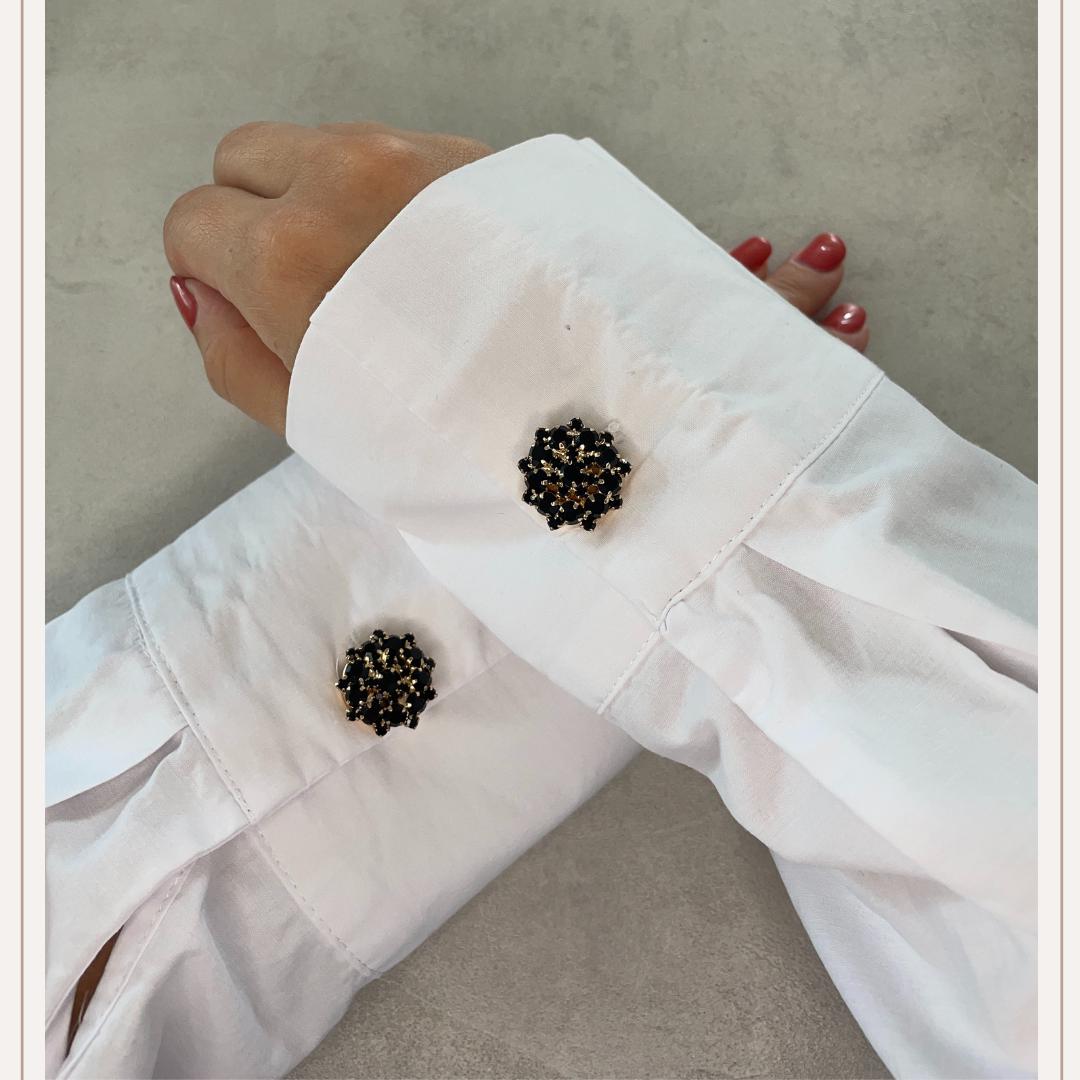 RoundBlackGoldButtonCover